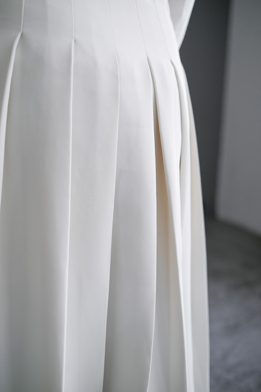 Юбка в складку молочная