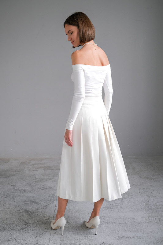 Юбка в складку молочная