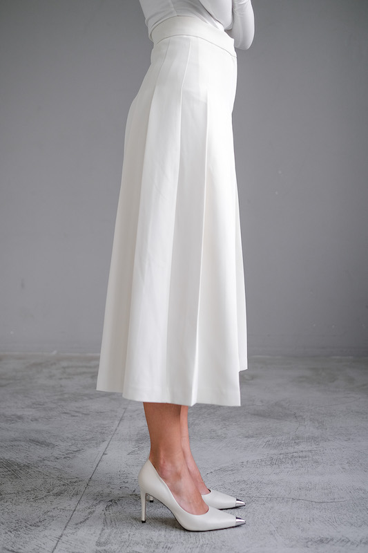 Юбка в складку молочная