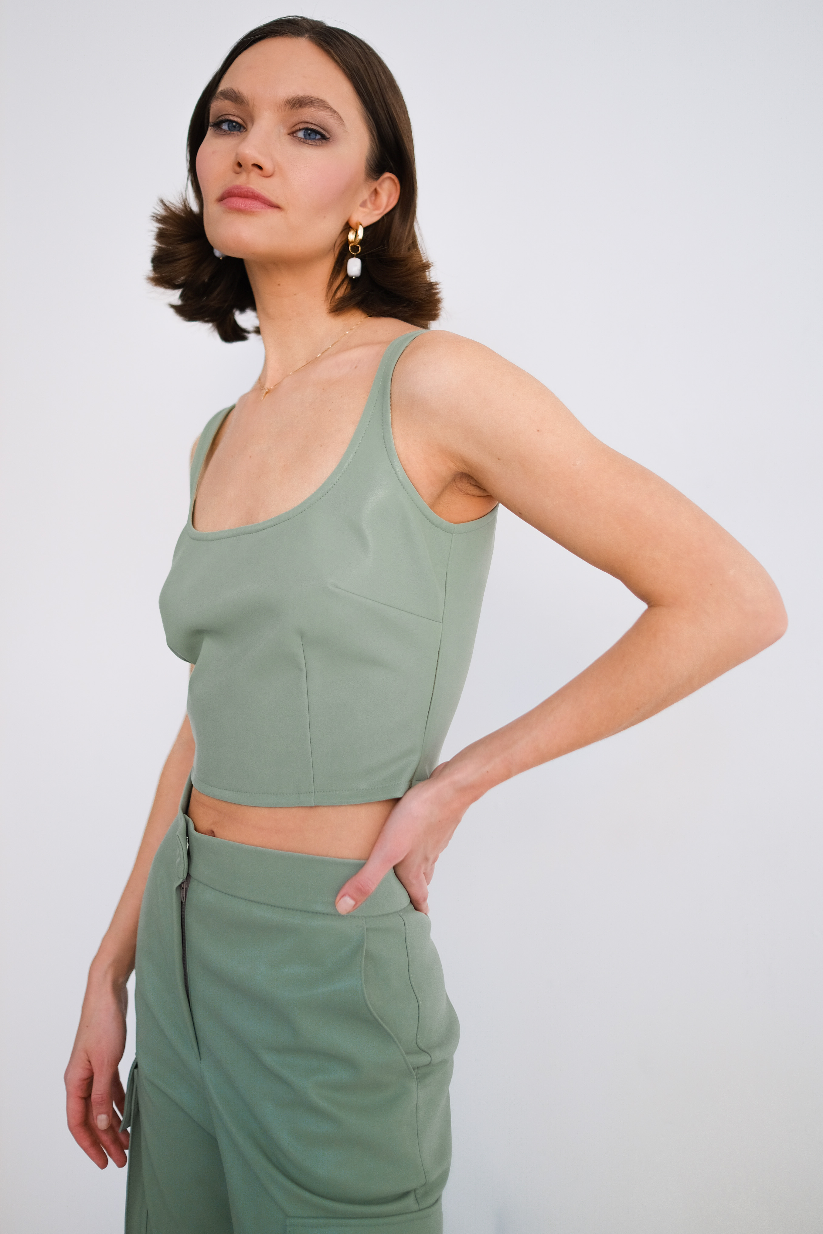 Топ из эко кожи фисташковый