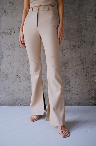 Брюки из эко кожи с разрезами 